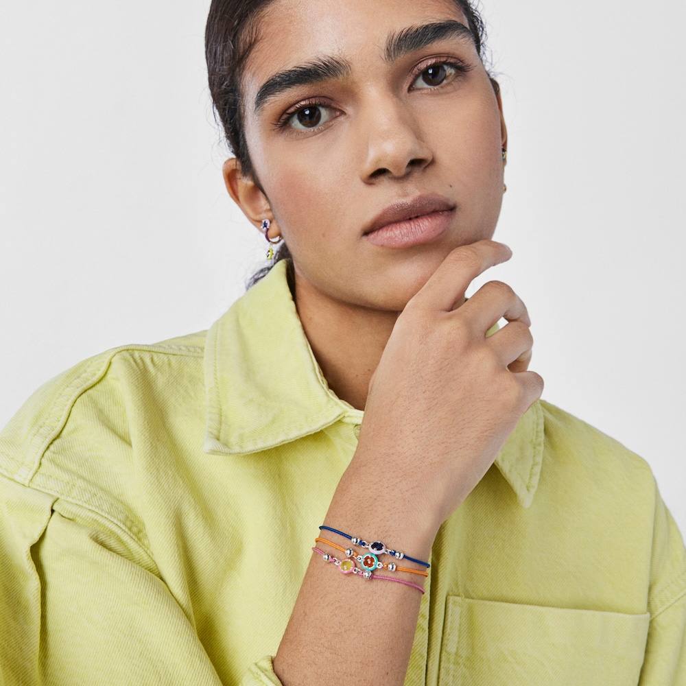 Bra&ccedil;alet TOUS Vibrant Colors de cord&oacute; rosa amb calced&ograve;nia i esmalt