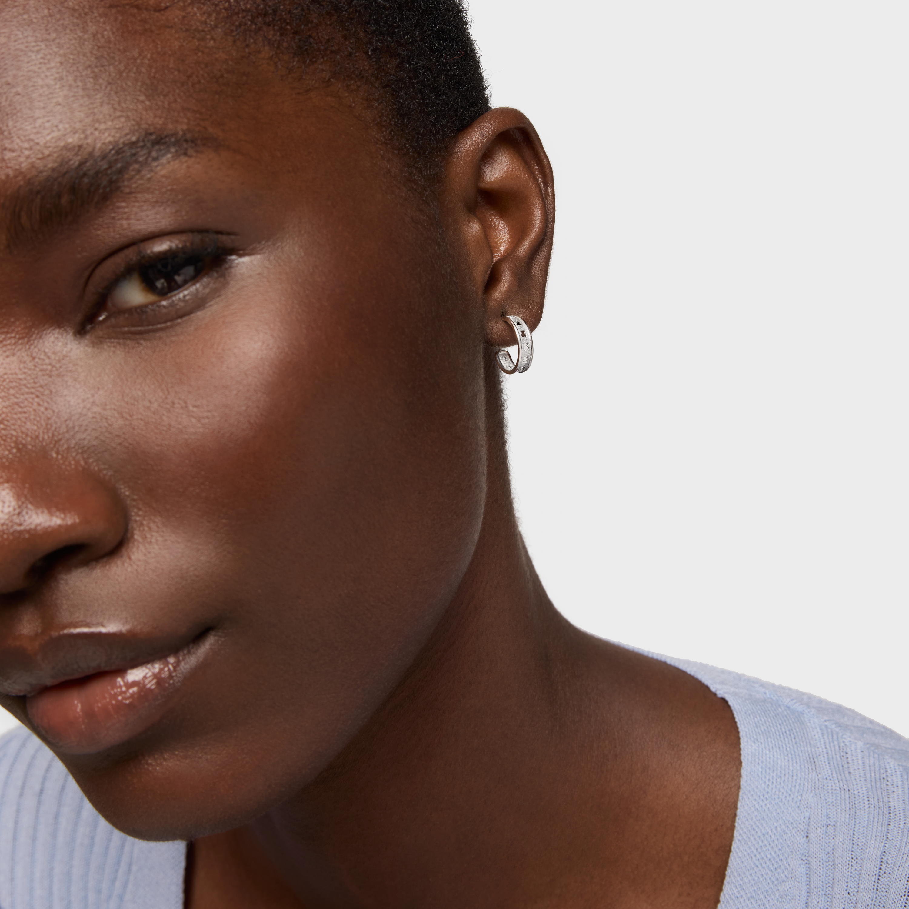 Small silver TOUS Bear Row hoop earrings with silhouette