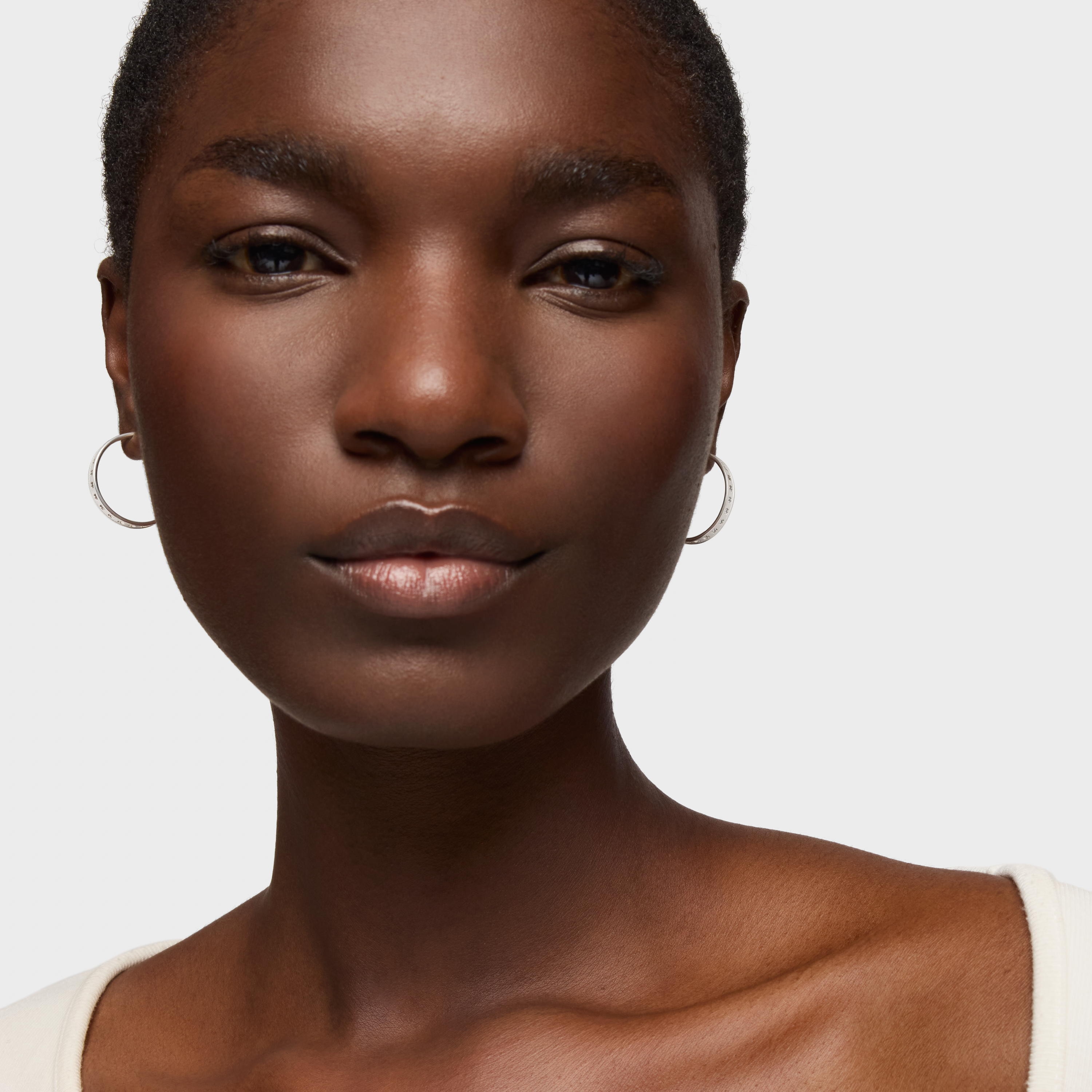 Silver TOUS Bear Row hoop earrings with bear silhouette