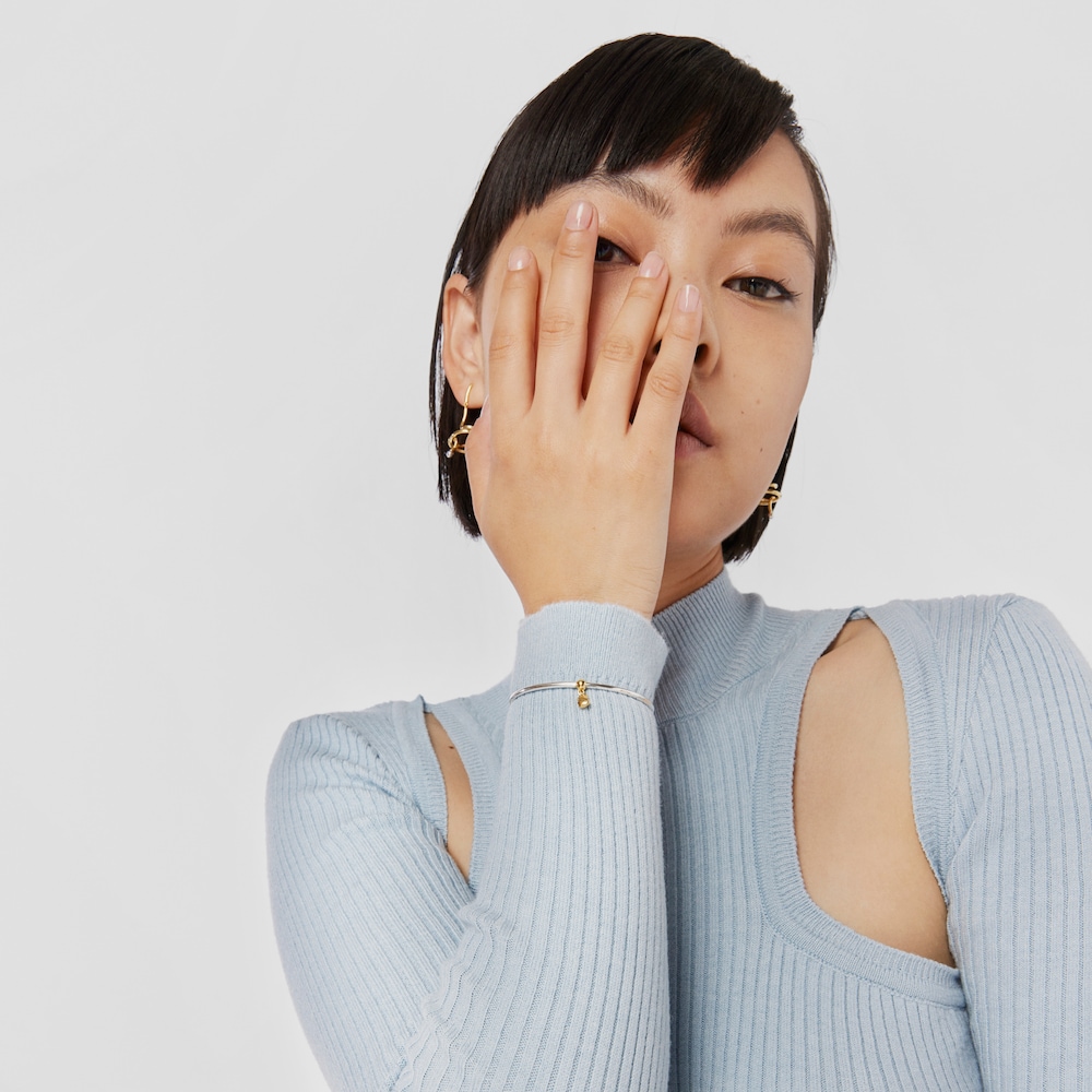 Pulsera bicolor con motivo oso Beach