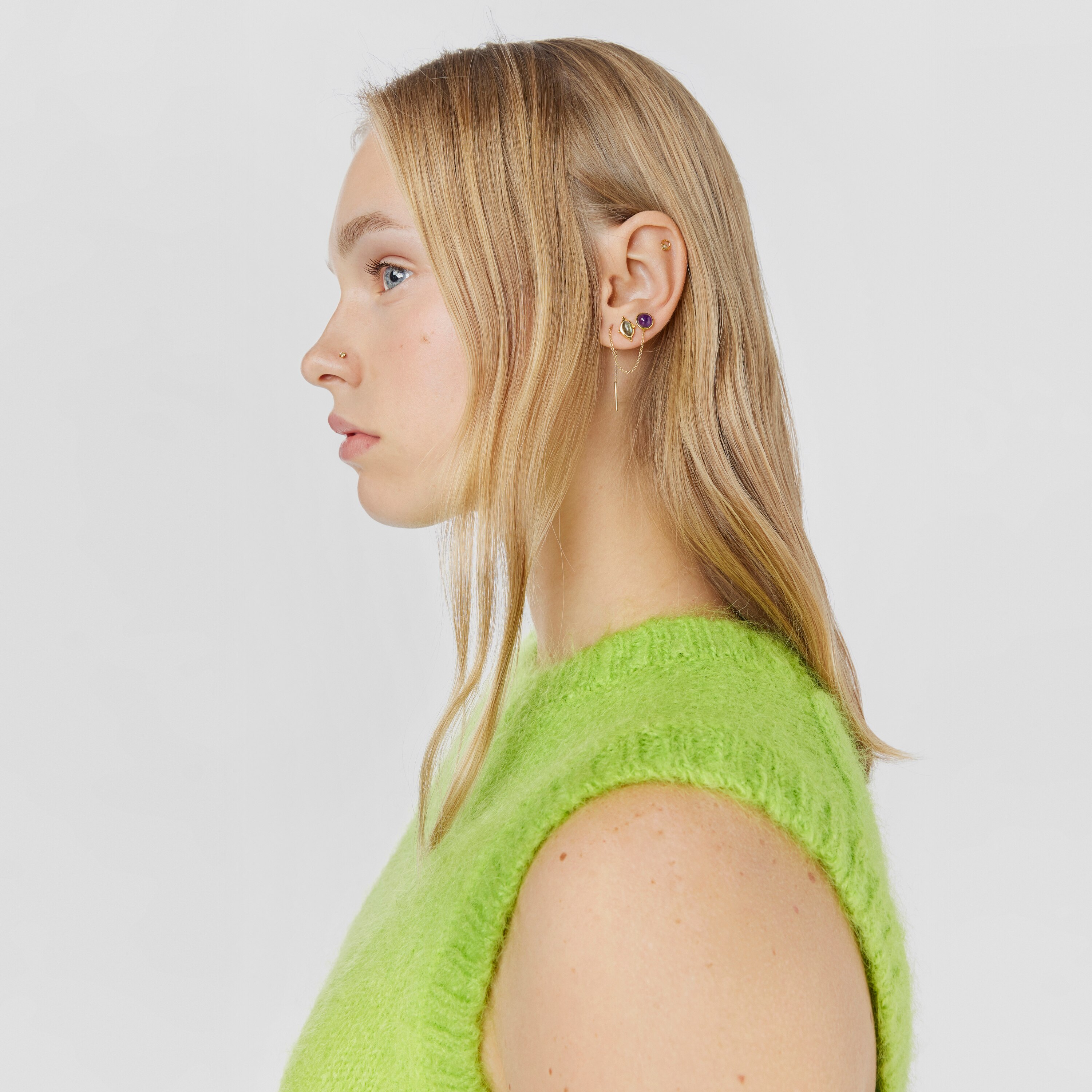 Gold-colored IP steel and garnet and peridot Beach Nose piercing