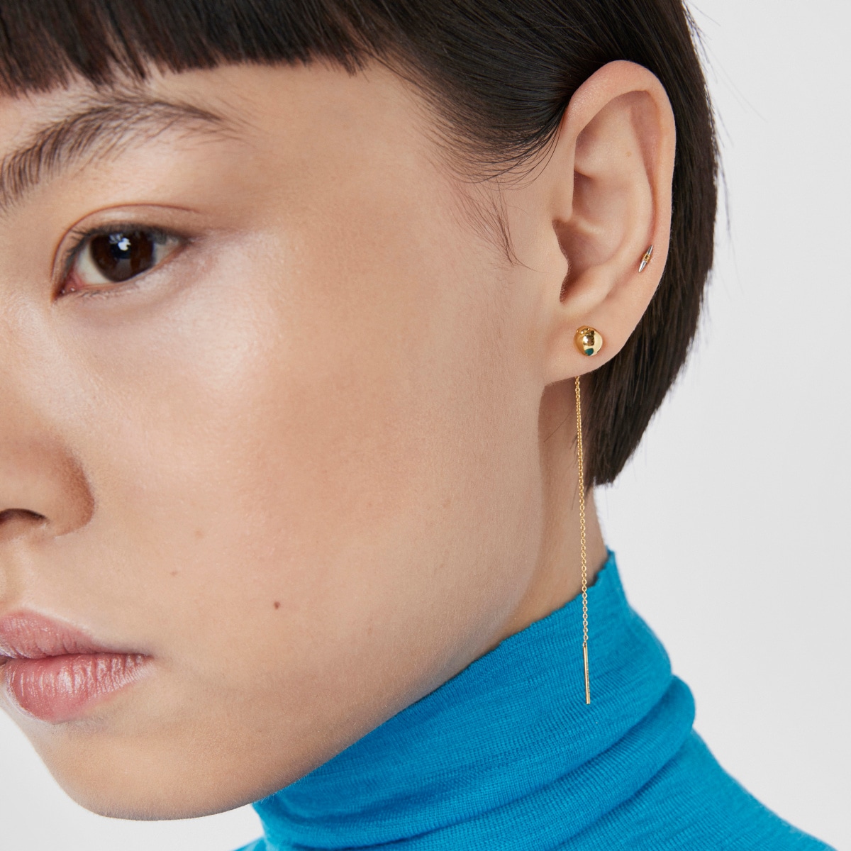 Steel and gold-colored IP steel Lure Piercing