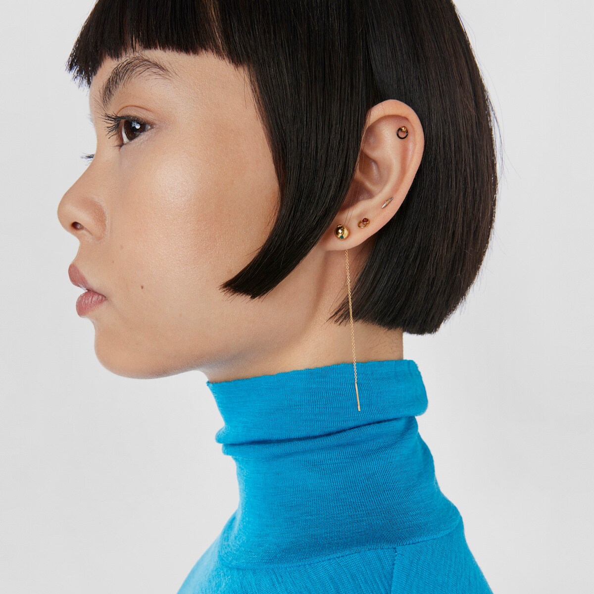 Black- and gold-colored IP steel Plump Piercing
