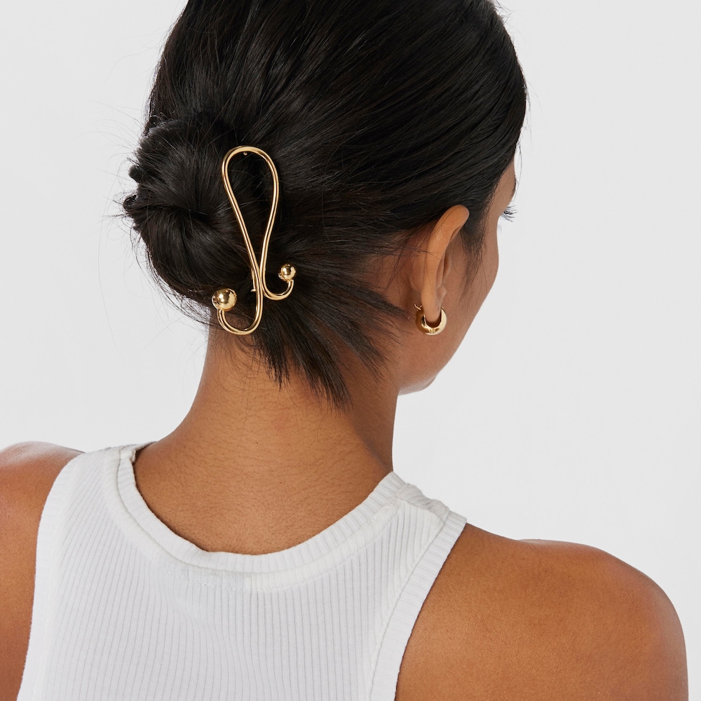 Fermall amb bany d'or 18 kt sobre plata Plump