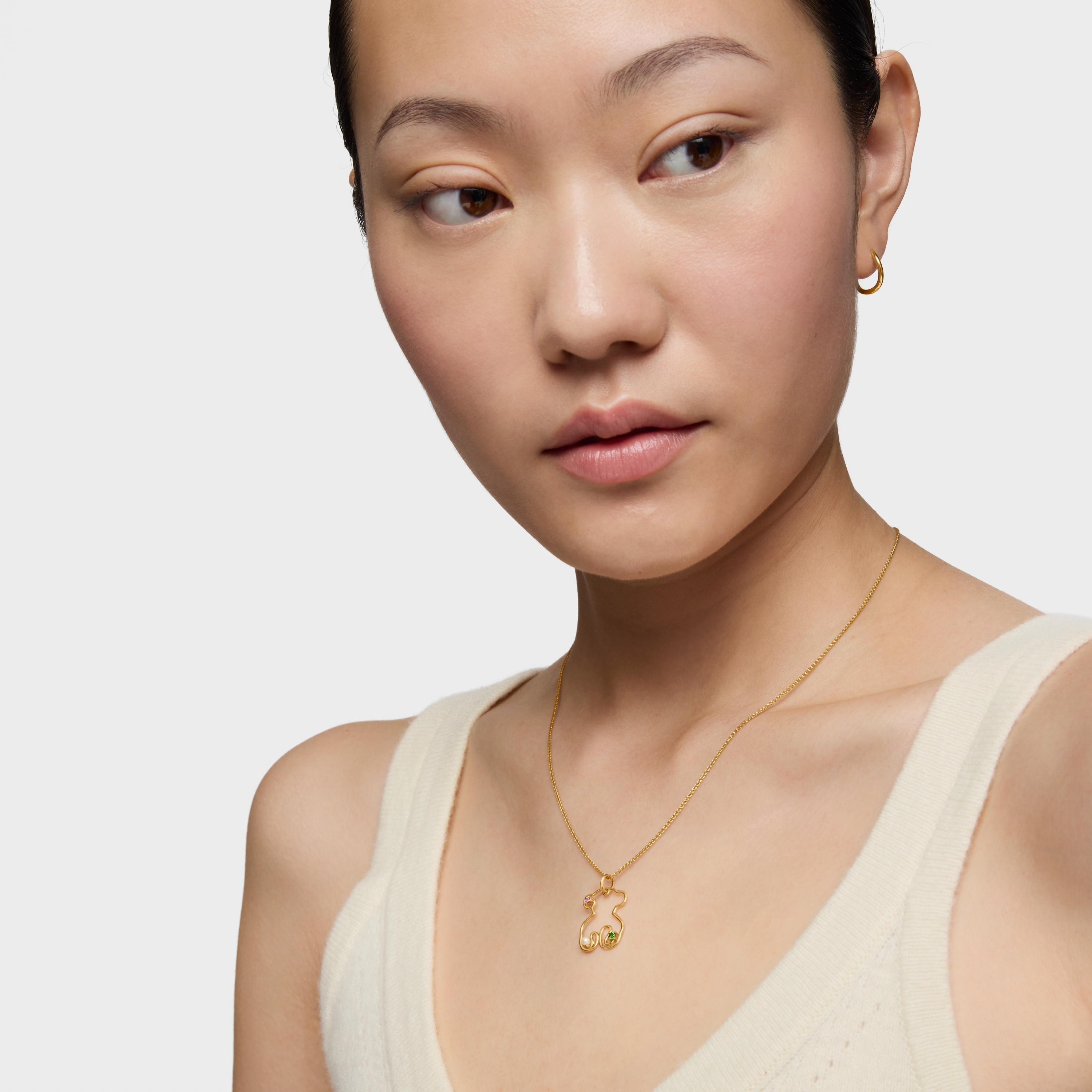 18K Solid Gold Tsuri Bear pendant with gemstones and a cultured pearl