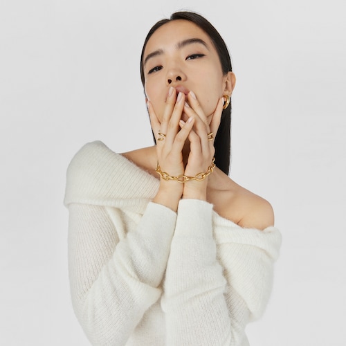 Collar con baño de oro 18 kt sobre plata y cuero Bent