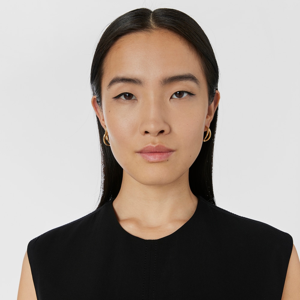 Aretes con ba&ntilde;o de oro 18 kt sobre plata Bent