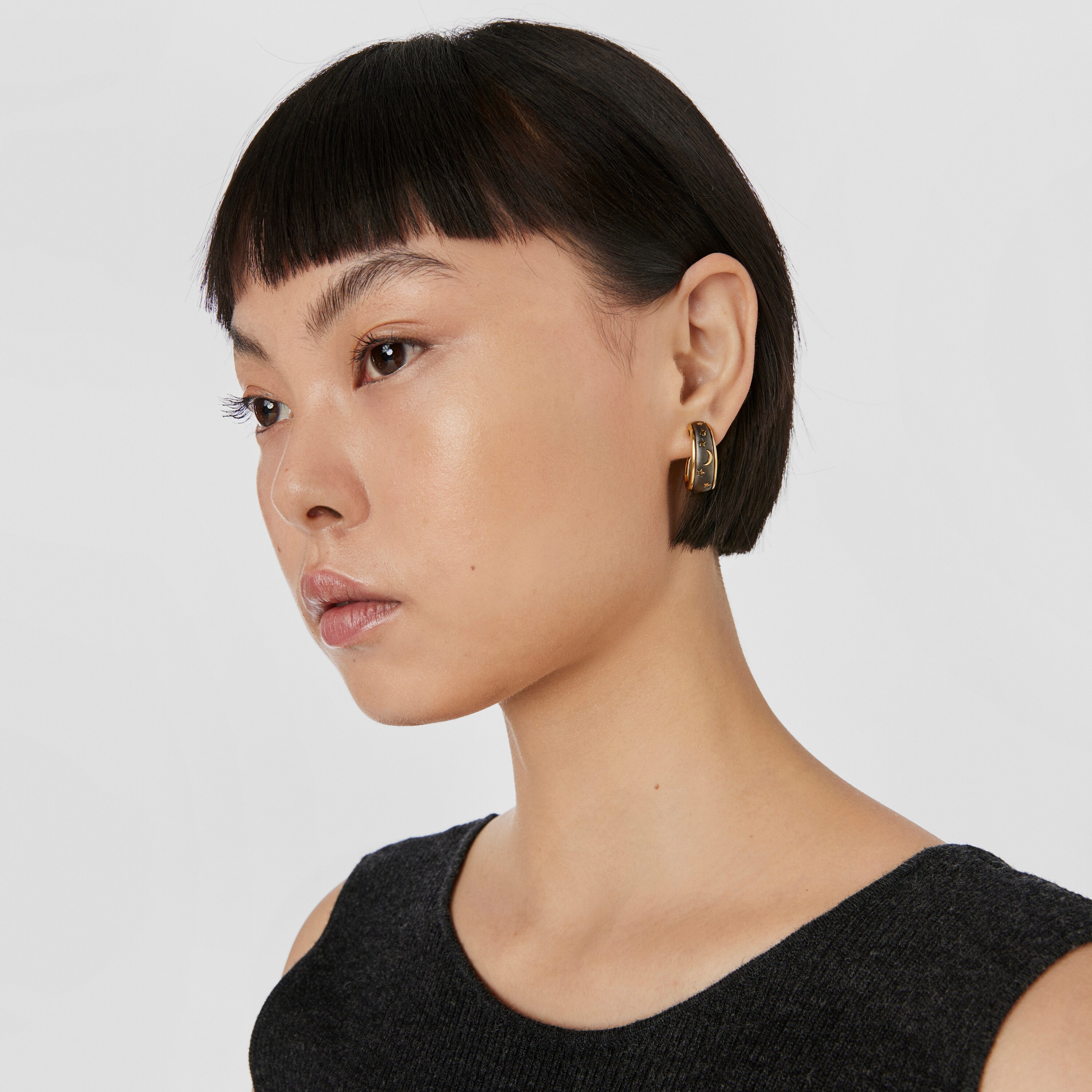 Pendientes de aro con baño de oro 18 kt sobre plata y dark silver Twiling