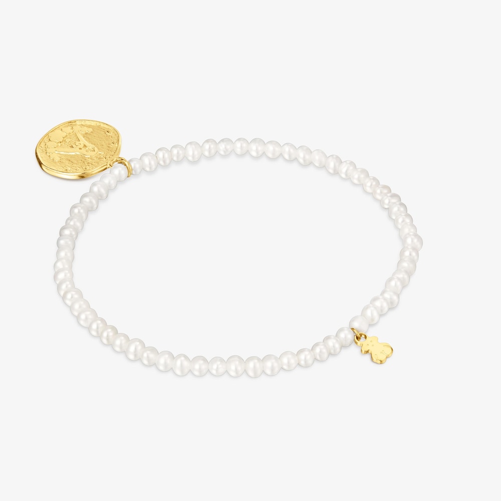 Pulsera el&aacute;stica de perlas cultivadas y medalla con ba&ntilde;o de oro 18 kt sobre plata Virgen de Guadalupe Devoci&oacute;n