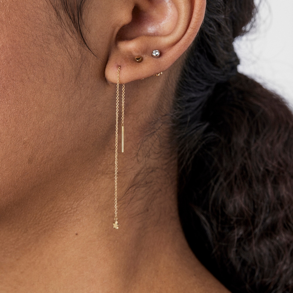 Aretes largos de oro con motivo estrella TOUS Cool Joy