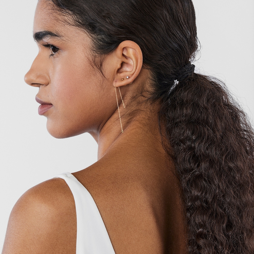 Aretes largos de oro con motivo estrella TOUS Cool Joy