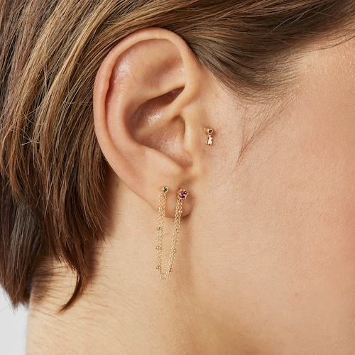 Piercing de oreja de oro con rodolita y motivo oso Cool Joy