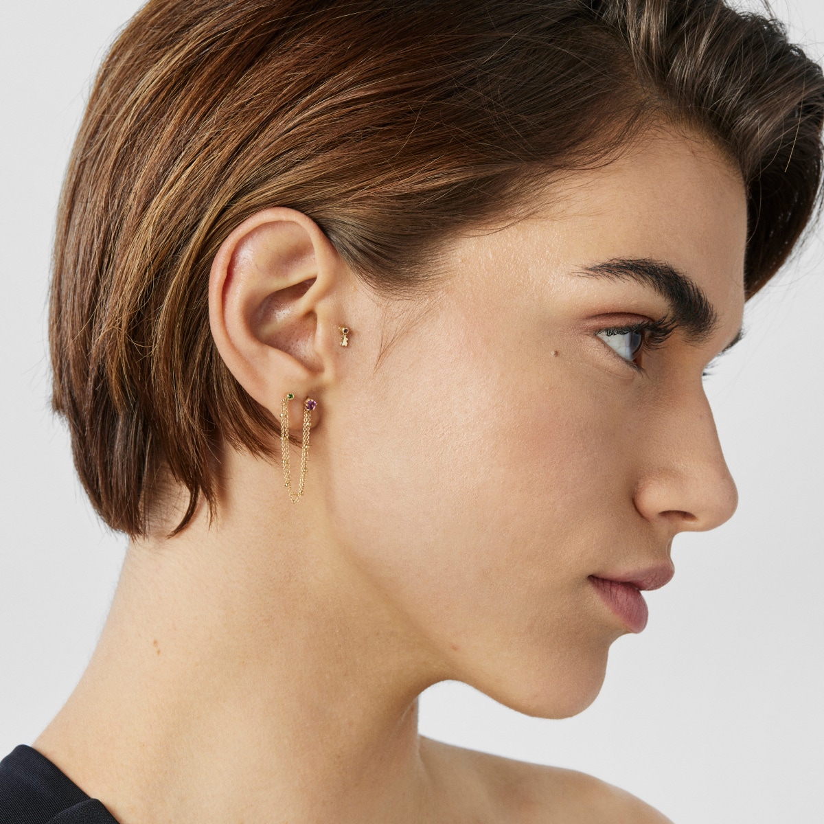 Gold TOUS Cool Joy Ear piercing with rhodolite and bear motif