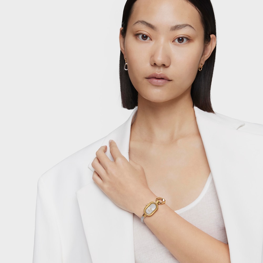 Zegarek analogowy ze stalową bransoletką i kopertą w kolorze złota IPG TOUS Hold Oval