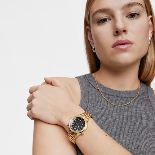 Reloj analógico con brazalete de acero IPG dorado y esfera negra TOUS Now
