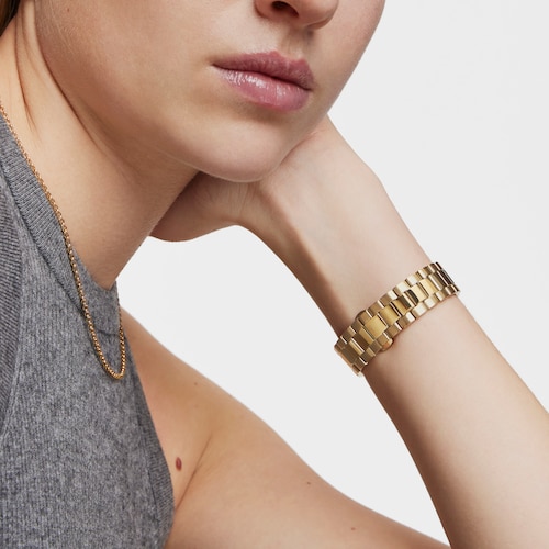 Reloj analógico con brazalete de acero IPG dorado y esfera negra TOUS Now