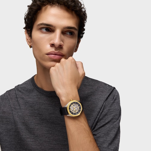 Reloj analógico automático con caja de acero IPG dorado y brazalete de silicona negra TOUS Now