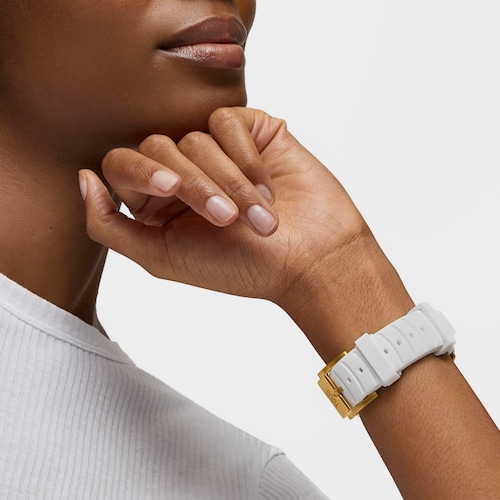 Reloj analógico automático con caja de acero IPG dorado y brazalete de silicona blanca TOUS Now