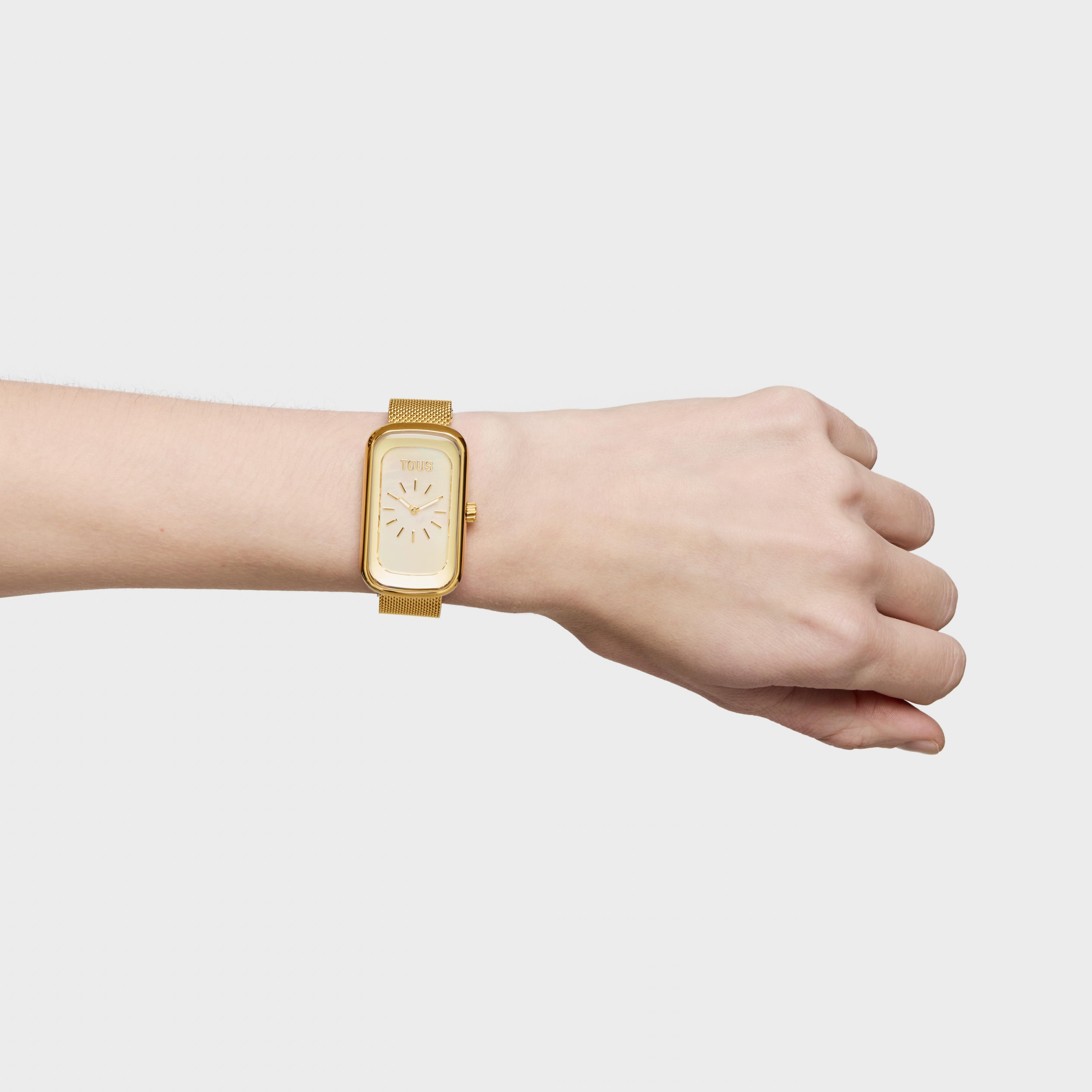 Analog watch with mother-of-pearl face and gold-colored steel