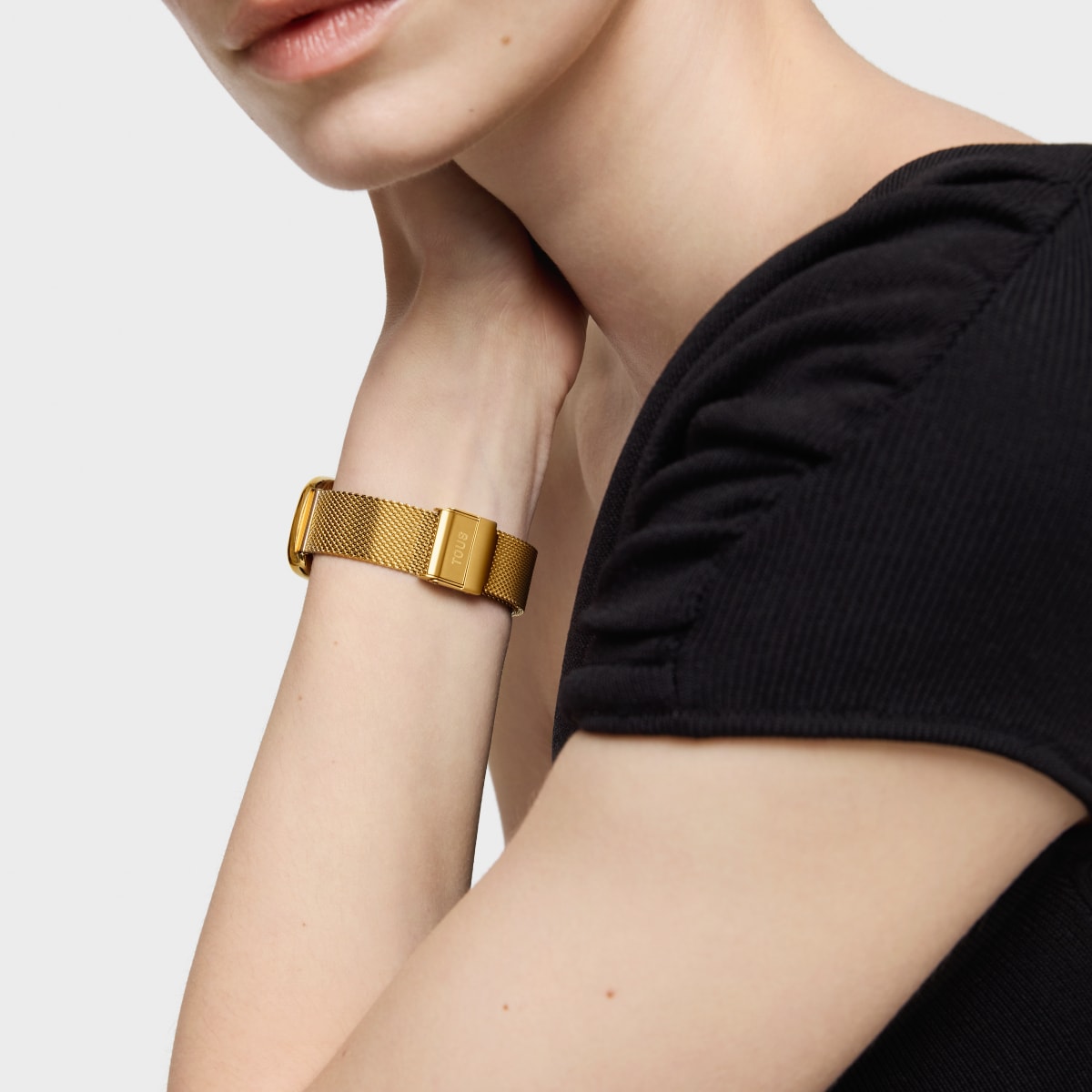 Analog watch with mother-of-pearl face and gold-colored steel bracelet T-Band Club