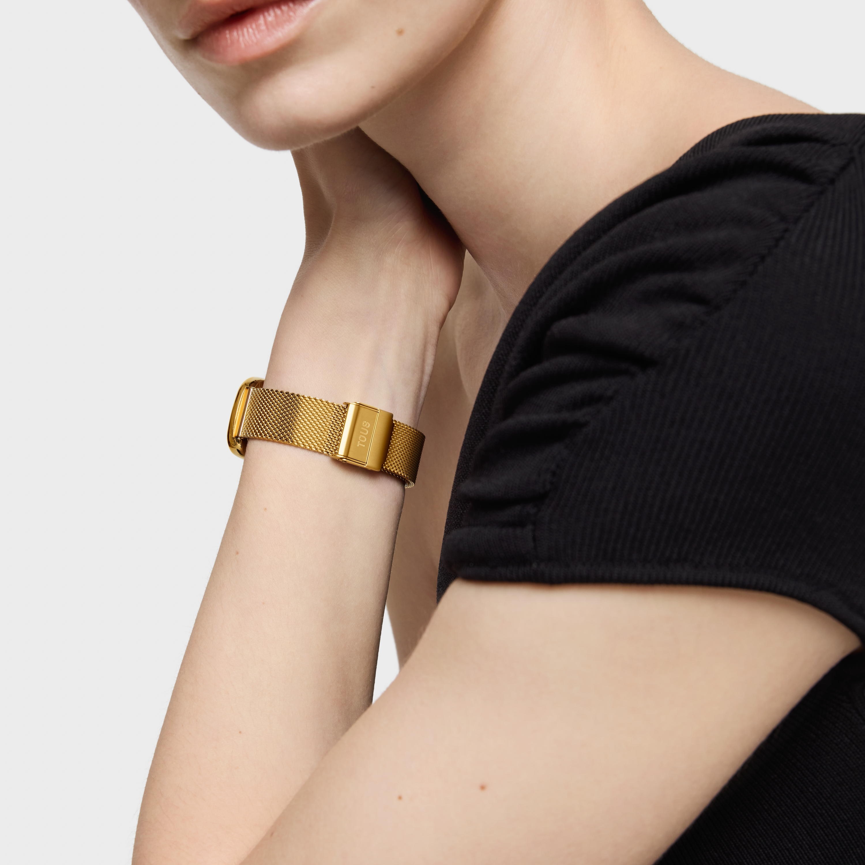 Reloj analógico con esfera de nácar y brazalete dorado T-Band Club