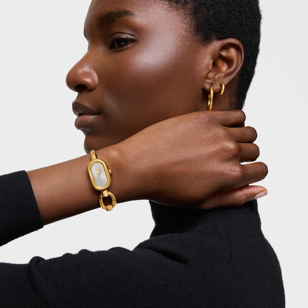 Analogov&eacute; a digit&aacute;ln&iacute; hodinky s&nbsp;n&aacute;ramkem z&nbsp;oceli zlat&eacute; barvy TOUS Hold Oval