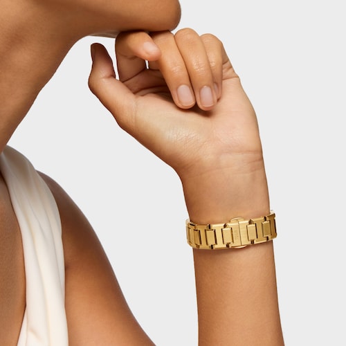 Reloj analógico con brazalete de acero dorado y esfera de nácar rosa Karat