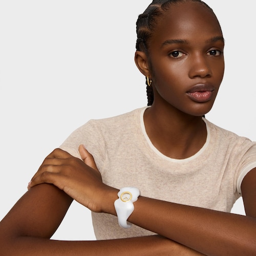 Reloj analógico de acero dorado y policarbonato blanco T. L Bear Folks