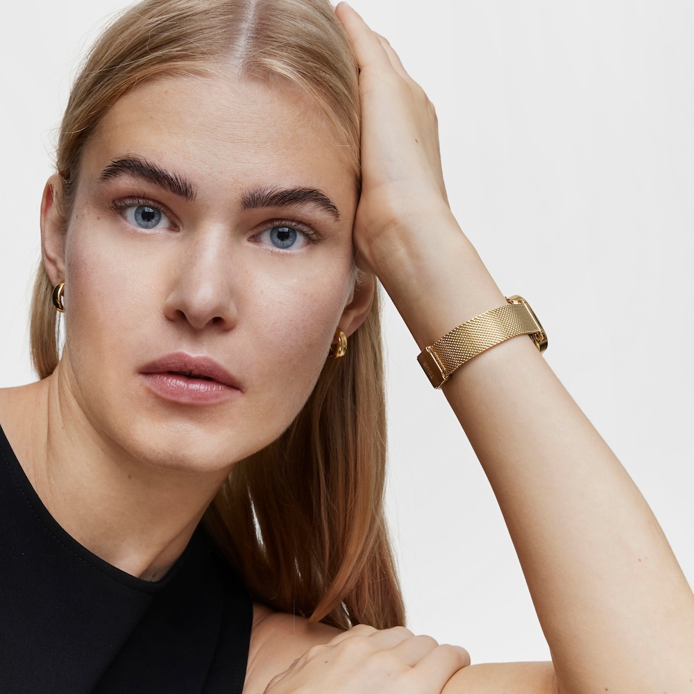 Rel&oacute;gio digital com bracelete em a&ccedil;o&nbsp;IPG dourado D-Logo New