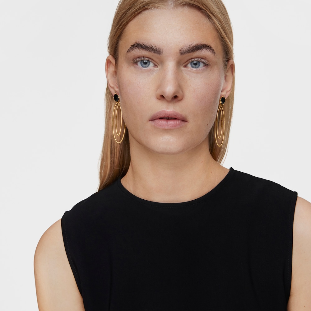 Aretes de aro con ba&ntilde;o de oro 18 kt sobre plata y &oacute;nix Cachito M&iacute;o