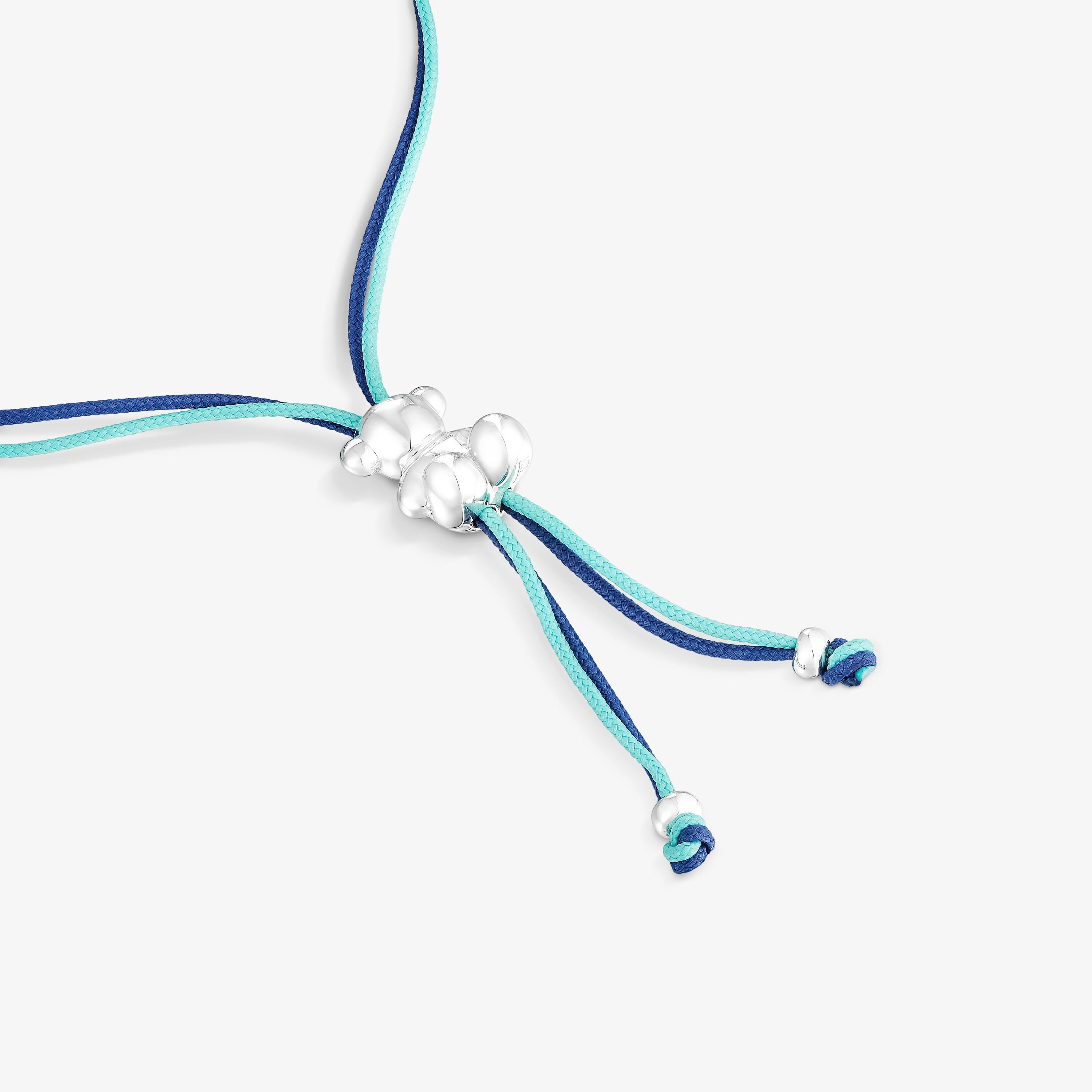 Bold Bear Bracelet with turquoise and navy blue cord and a silver bear