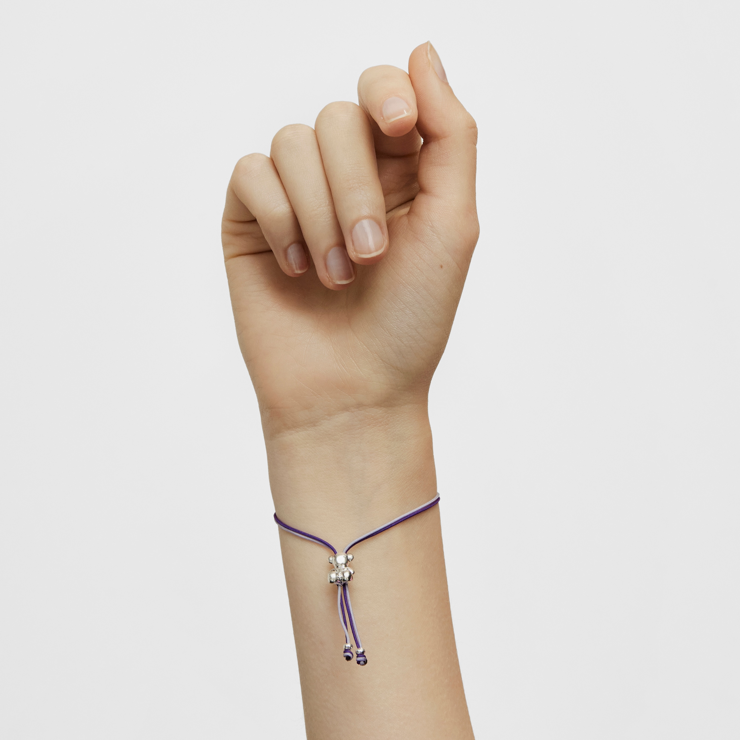 Bold Bear Bracelet with lilac and mauve cord and a silver bear