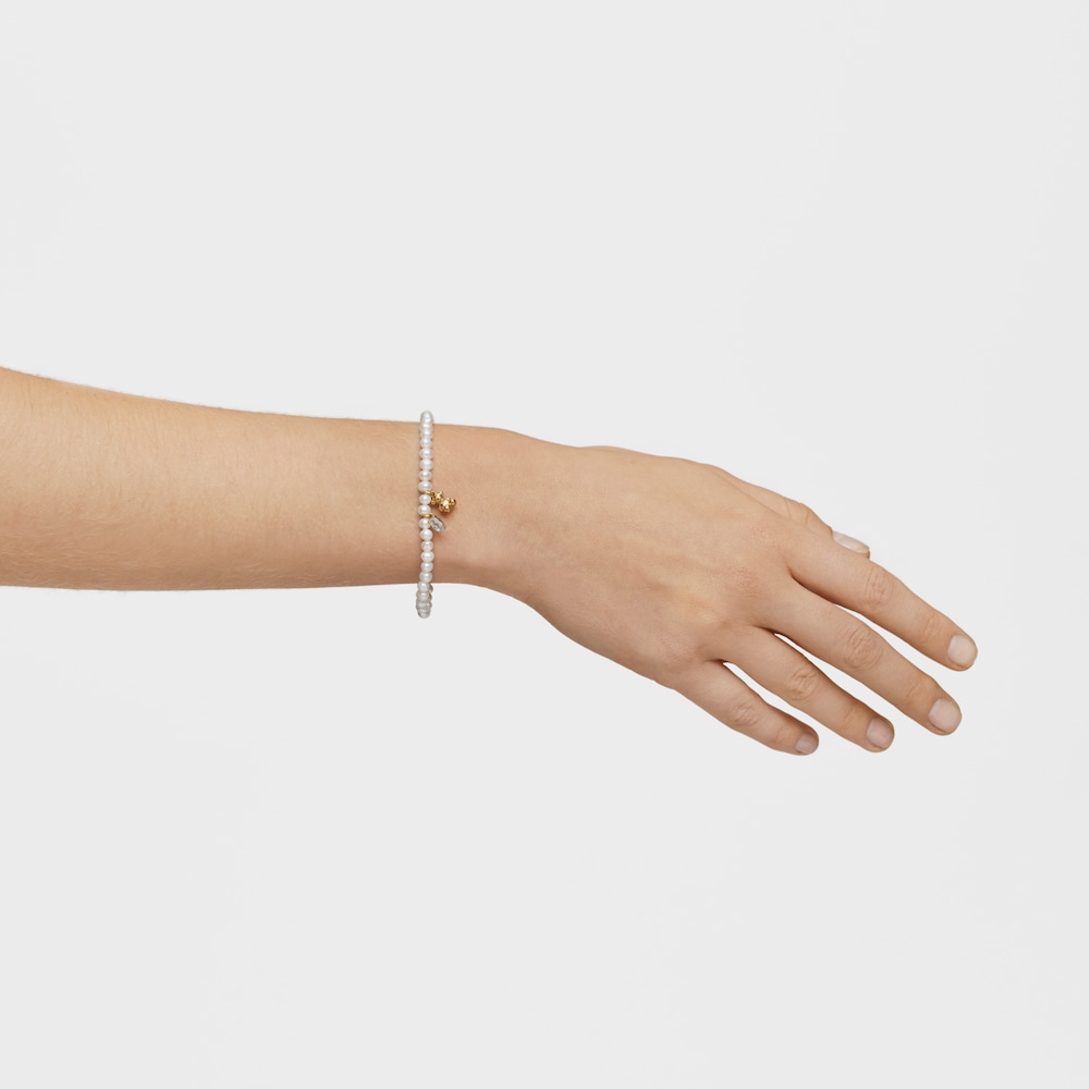 Elastick&yacute; N&aacute;ramek s&nbsp;pozlacen&yacute;m stř&iacute;brem, uměle vypěstovan&yacute;mi perlami a&nbsp;topazem Bold Bear