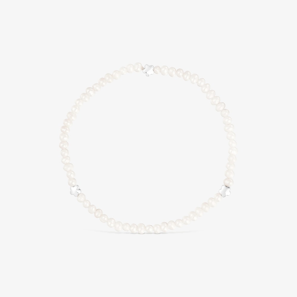 Elastic Bold Motif Bracelet with cultured pearls and flower motifs in silver