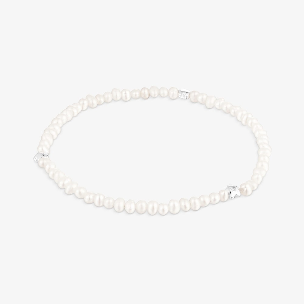 Elastic Bold Motif Bracelet with cultured pearls and flower motifs in silver
