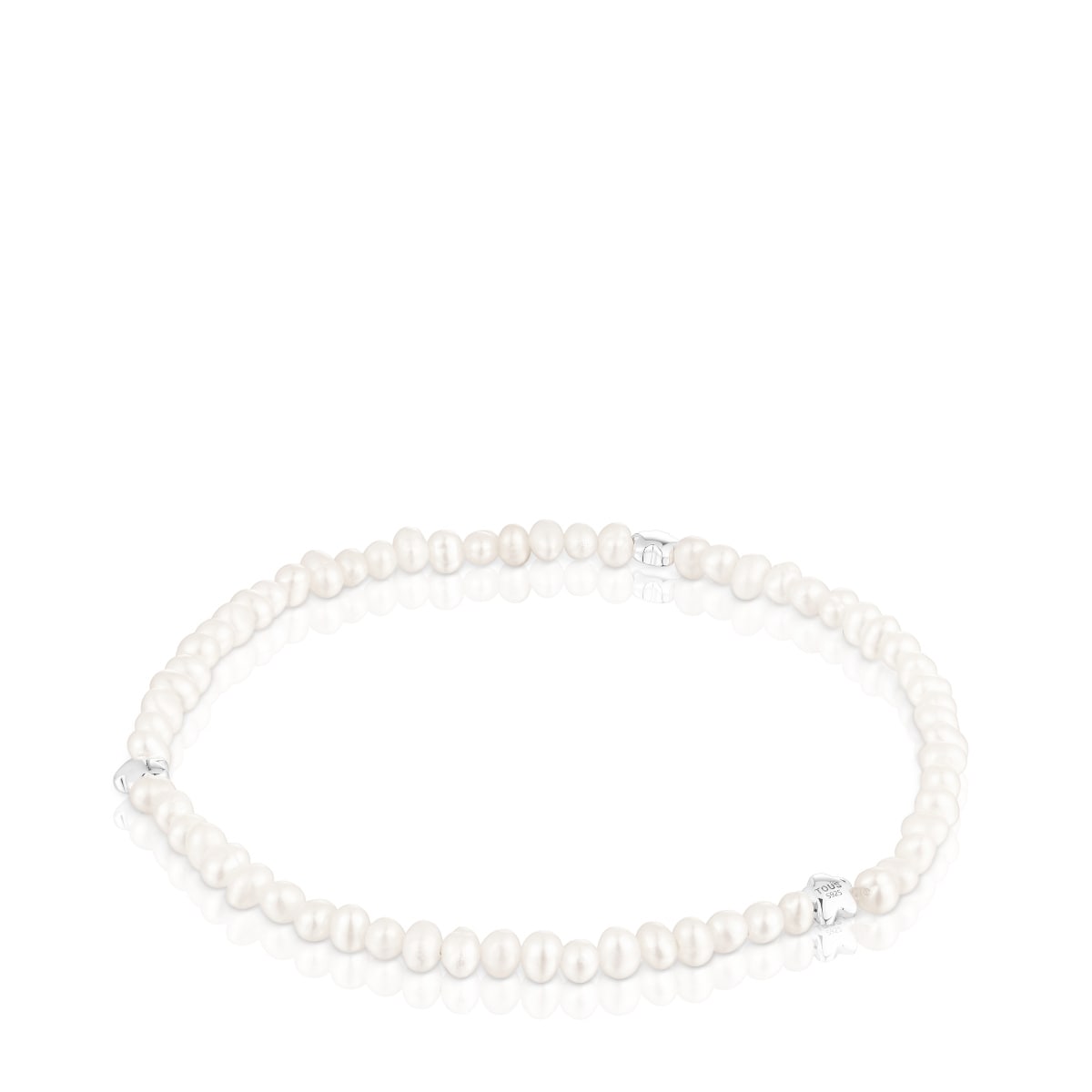 Elastic Bold Motif Bracelet with cultured pearls and flower motifs in silver