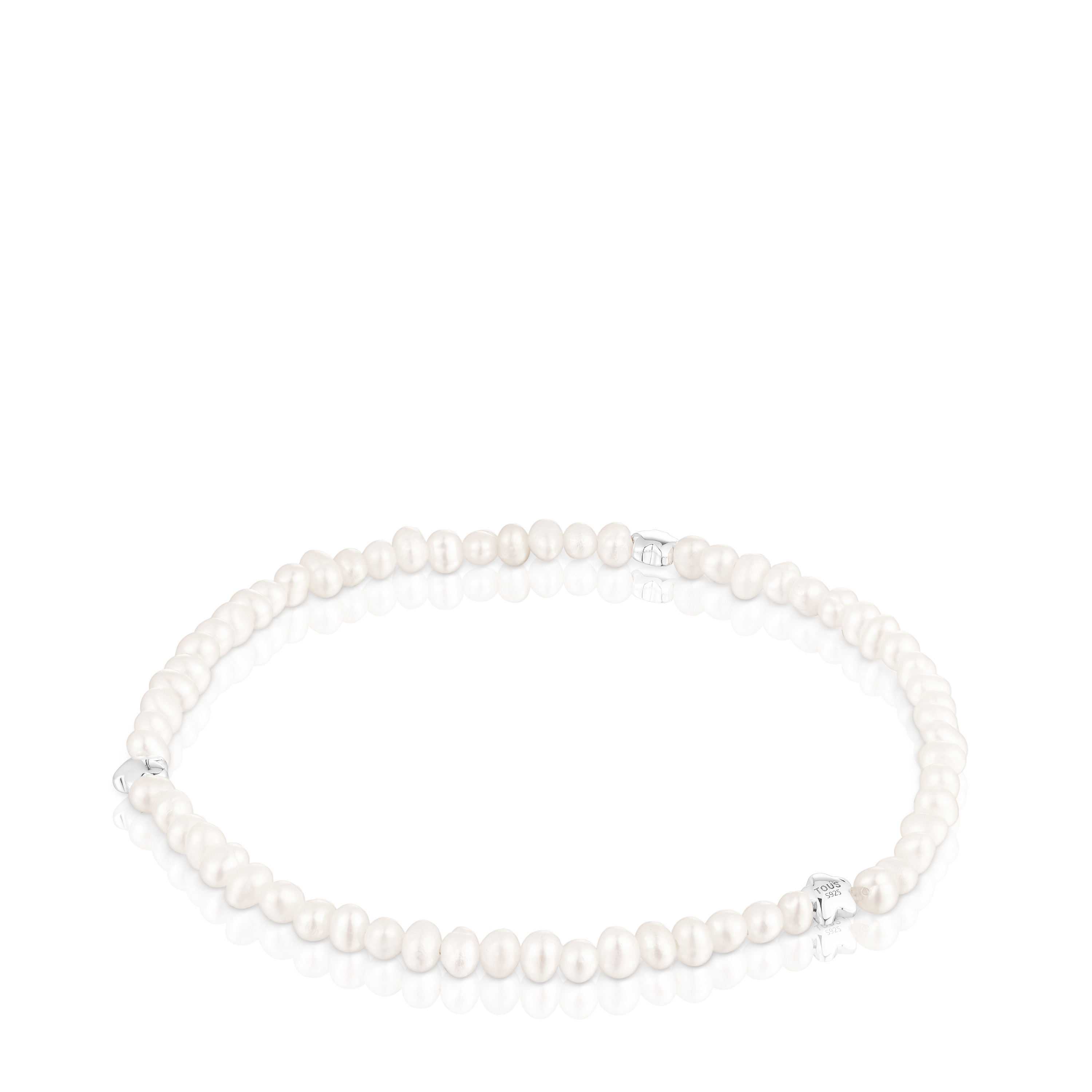 Elastic Bold Motif Bracelet with cultured pearls and flower motifs in silver