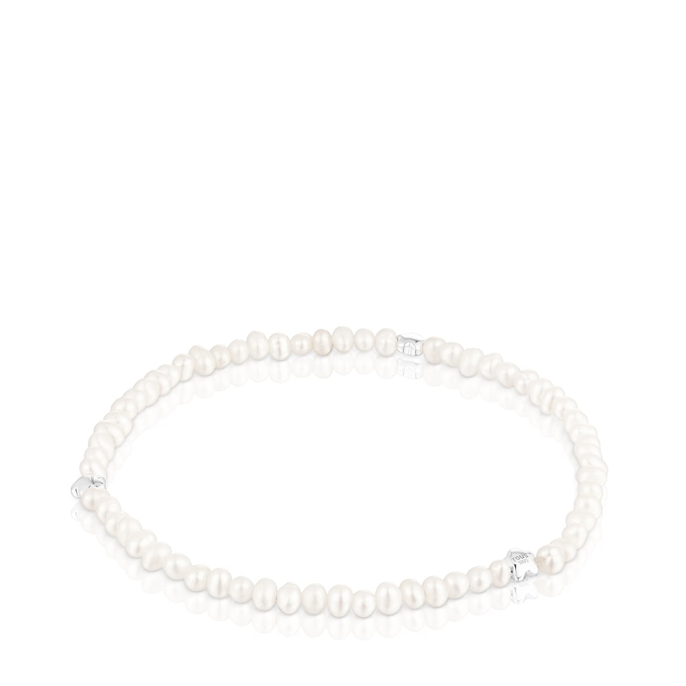 Elastic Bold Motif Bracelet with cultured pearls and flower motifs in silver
