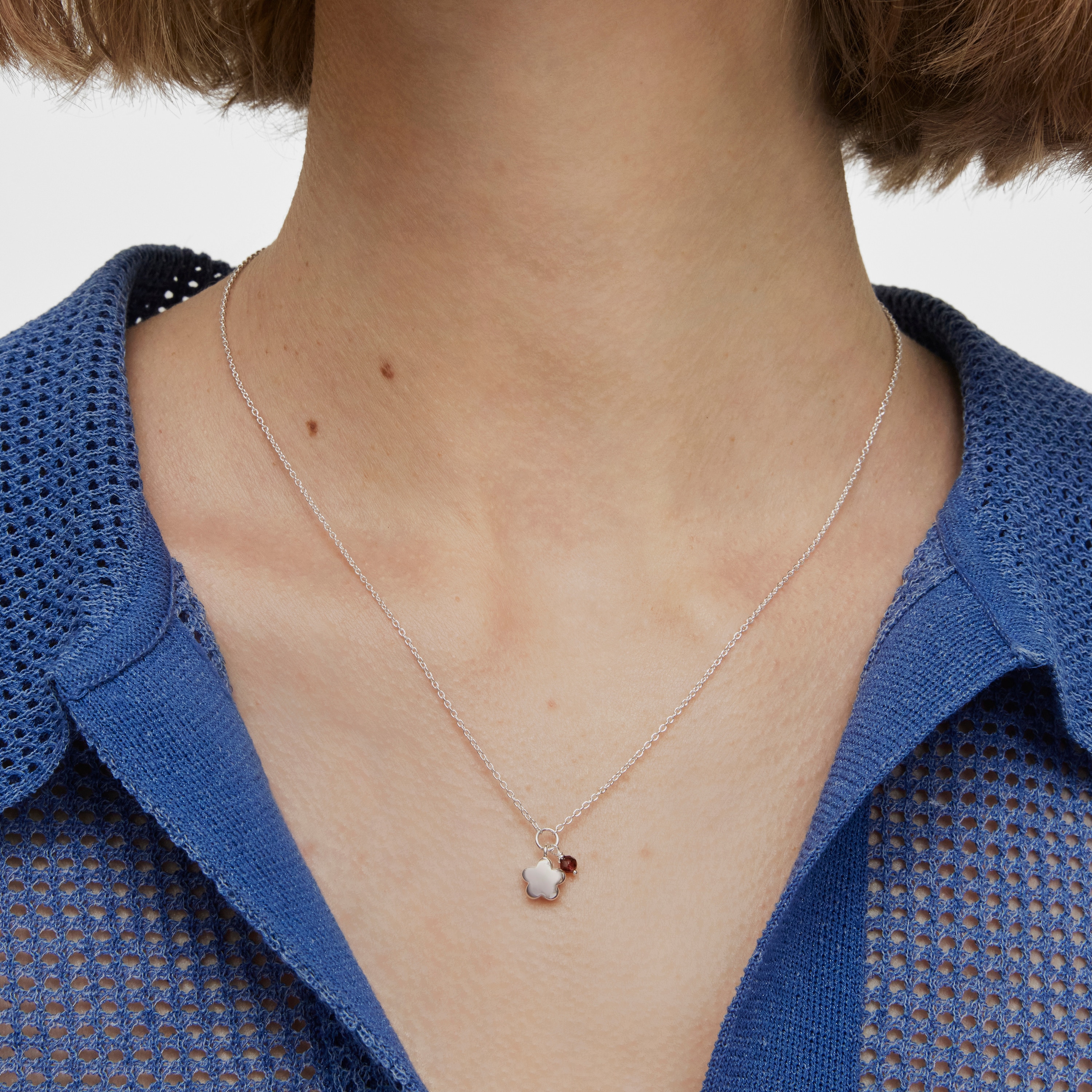 Silver Bold Motif Necklace with a rhodolite flower