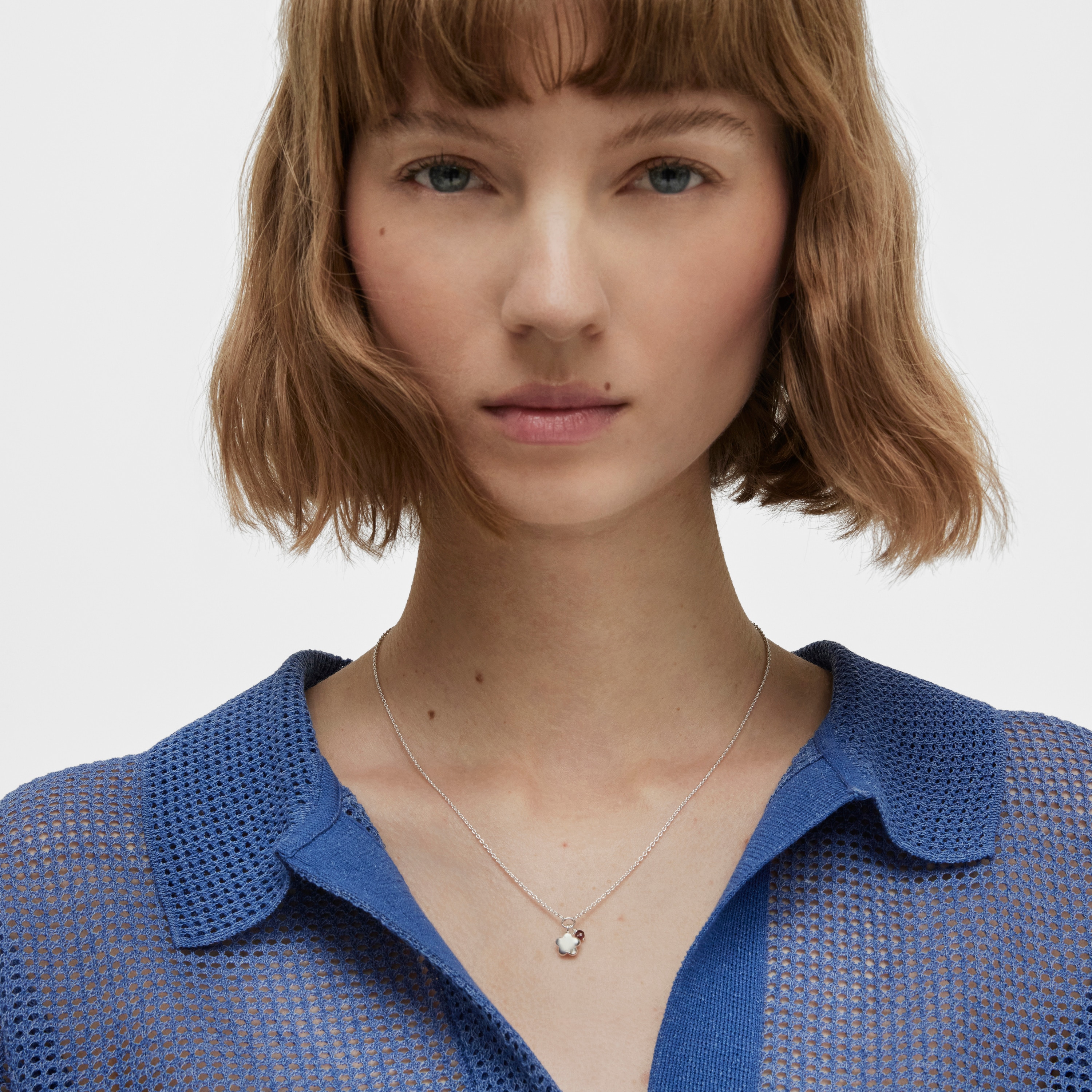 Silver Bold Motif Necklace with a rhodolite flower