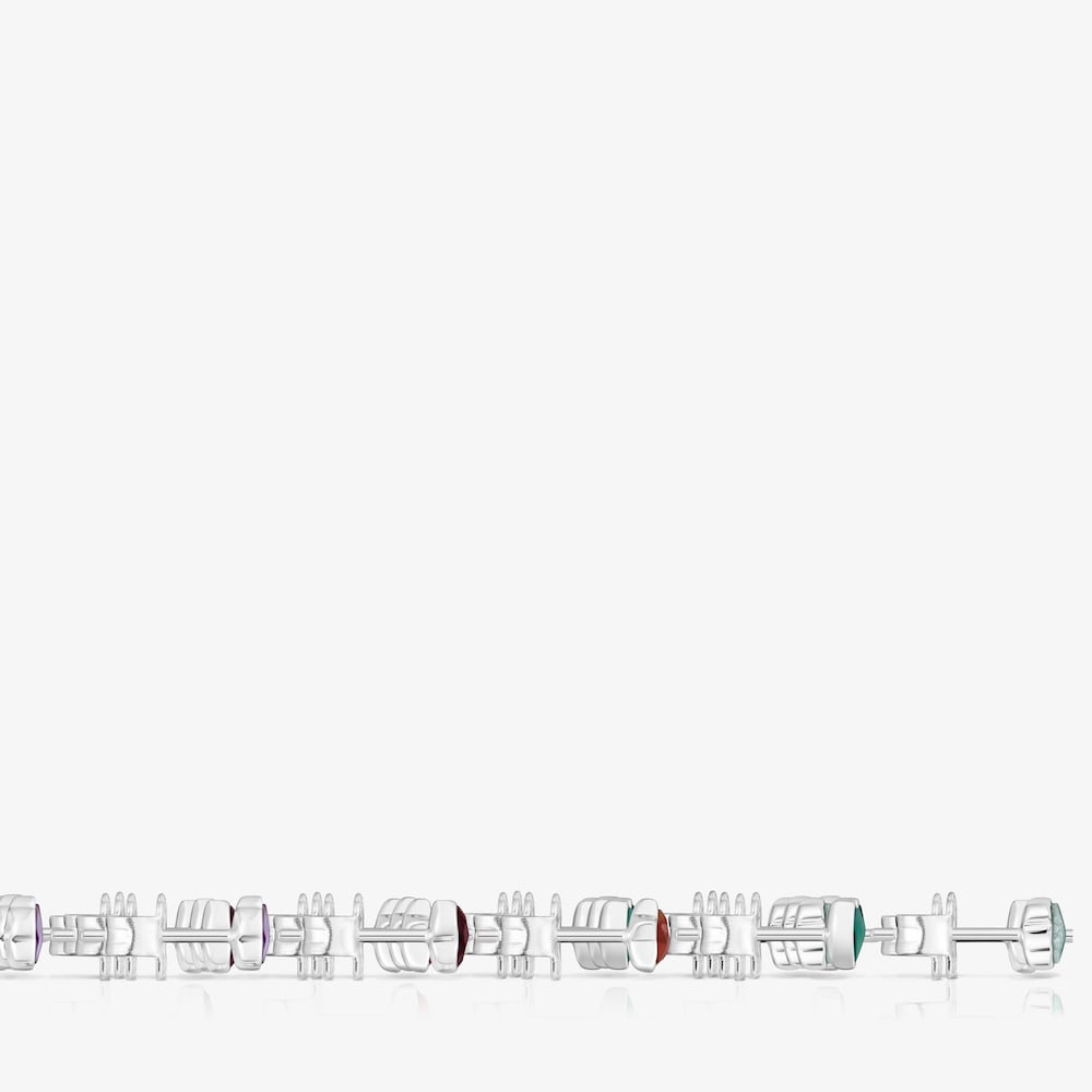 Set of loose silver Bold Motif Earrings with gemstones