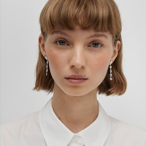 Large silver Bold Motif Earrings with motifs