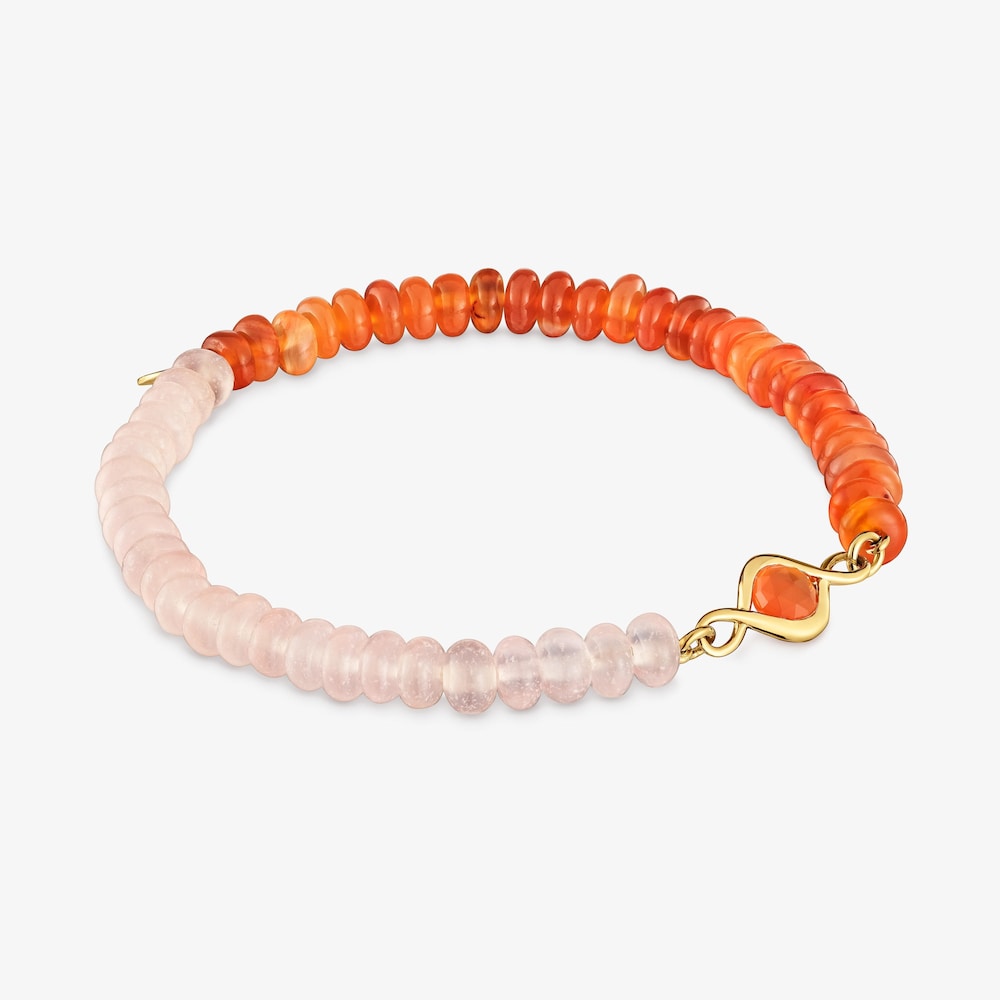 Pulsera el&aacute;stica con ba&ntilde;o de oro 18 kt, cornalina y gemas Alma Motif