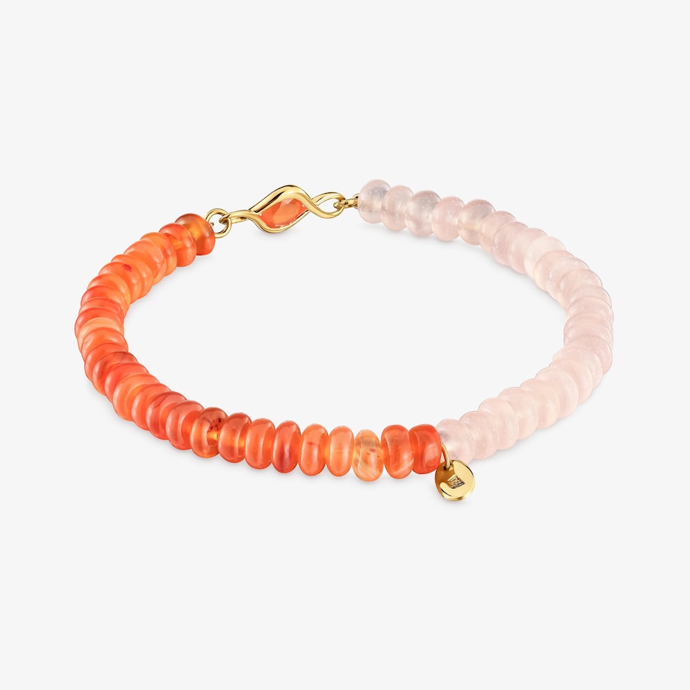 Pulsera el&aacute;stica con ba&ntilde;o de oro 18 kt, cornalina y gemas Alma Motif