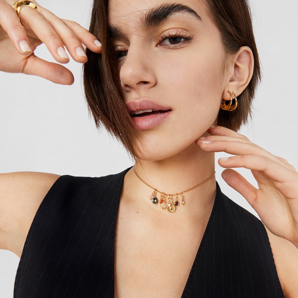 Colgante con ba&ntilde;o de oro 18 kt y topacio Alma Motif