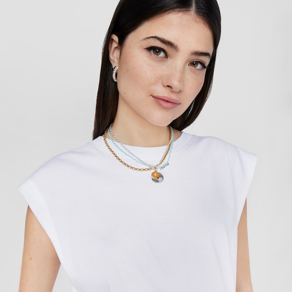 Dije medalla con ba&ntilde;o de oro 18 kt sobre plata y n&aacute;car oso Aelita