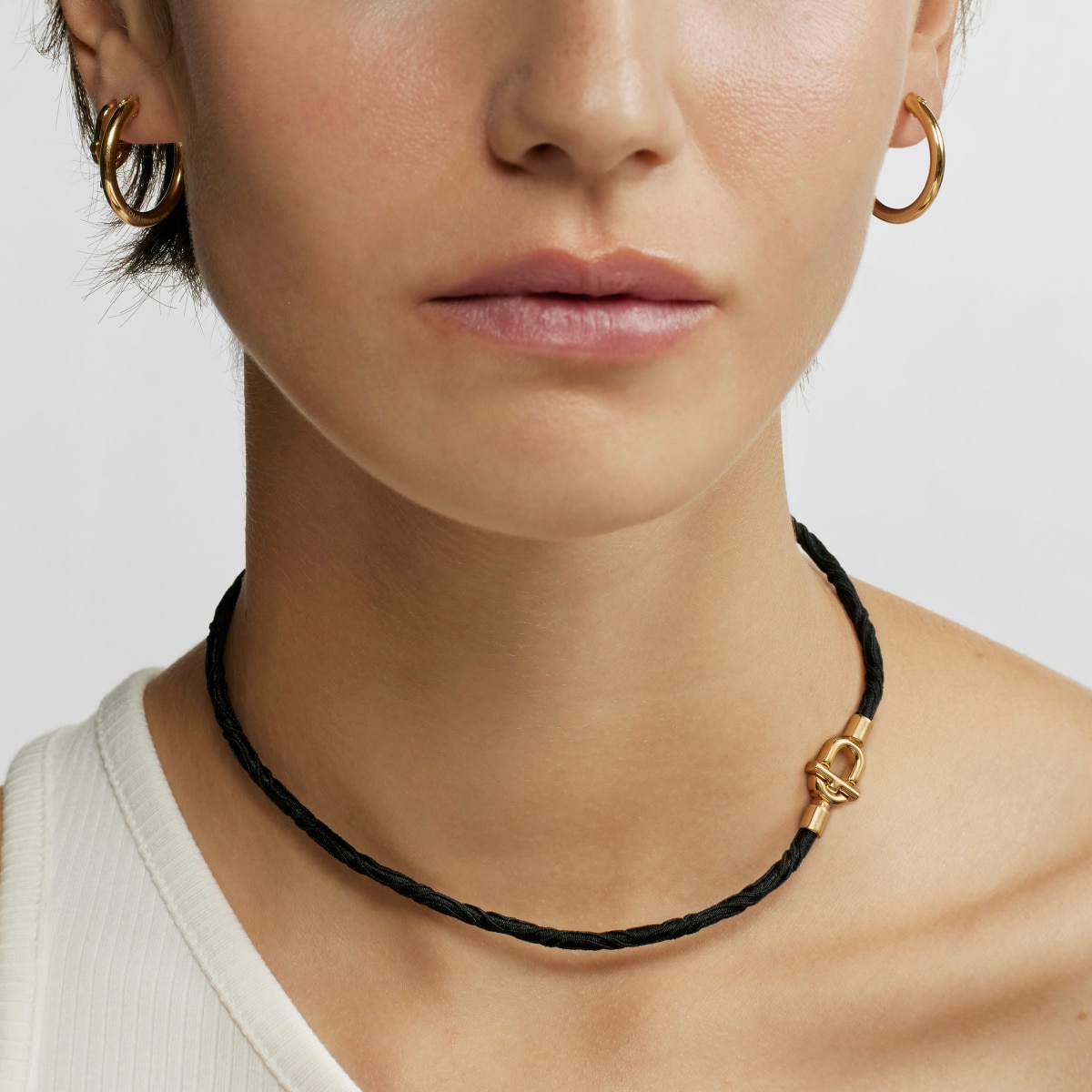 TOUS MANIFESTO Elastic necklace-bracelet with 18 kt gold plating over silver and black cord