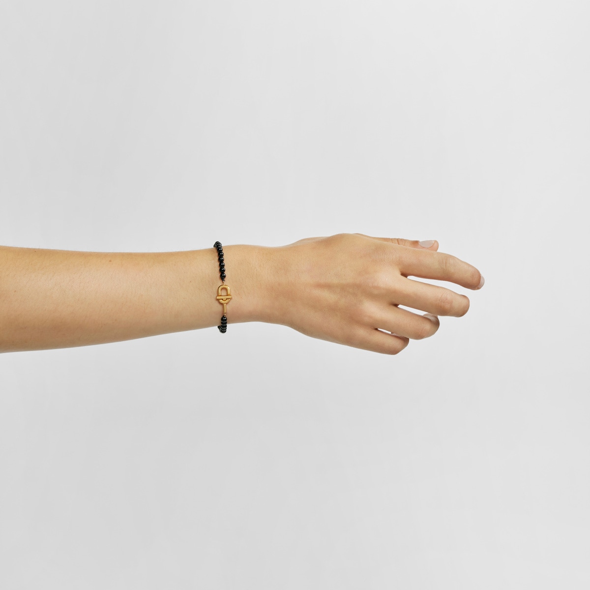 Bracelet with 18kt gold plating over silver and onyx TOUS MANIFESTO