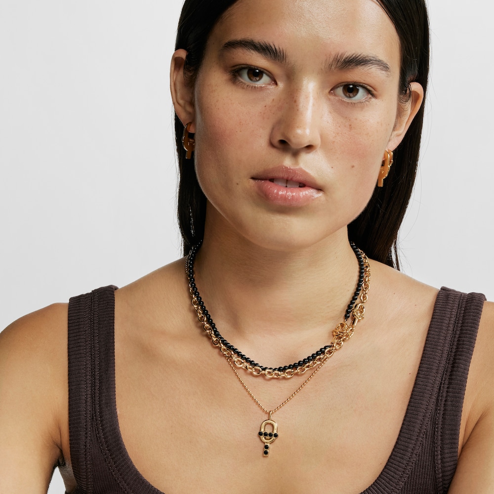 Pendant with 18kt gold plating over silver and onyx TOUS MANIFESTO