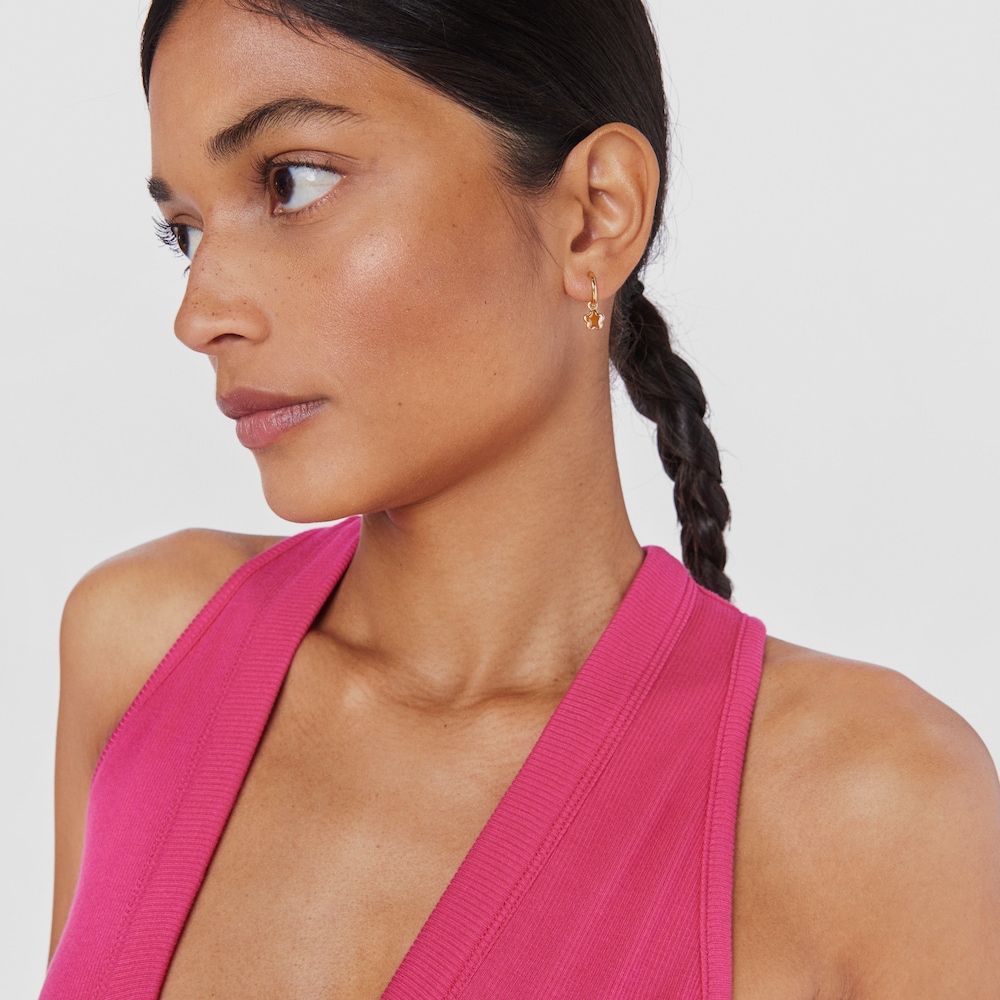 Aretes aro con ba&ntilde;o de oro 18 kt sobre plata flor naranja Gregal